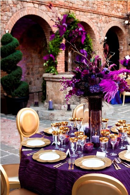 Elegant purple and gold table setting representing A Certain Woman and Dinner En Violette